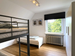 Schlafzimmer OG 1 - Ein Haus. Zwei Einheiten. Viele Möglichkeiten