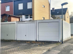 Garage mit neuwertigem elektrischen Sektionaltor - Raumwunder in Geismar