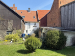 Aussenansichten - Flexibles Stadthaus in zentraler Lage von Dransfeld – Wohnen oder investieren