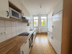 Küche mit Ausgang zum Balkon - Repräsentative Traumwohnung in Innenstadtnähe!