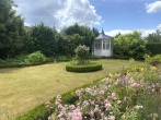 Aussenansichten - Einfamilienbungalow mit Traumgarten – Plesseblick inklusive